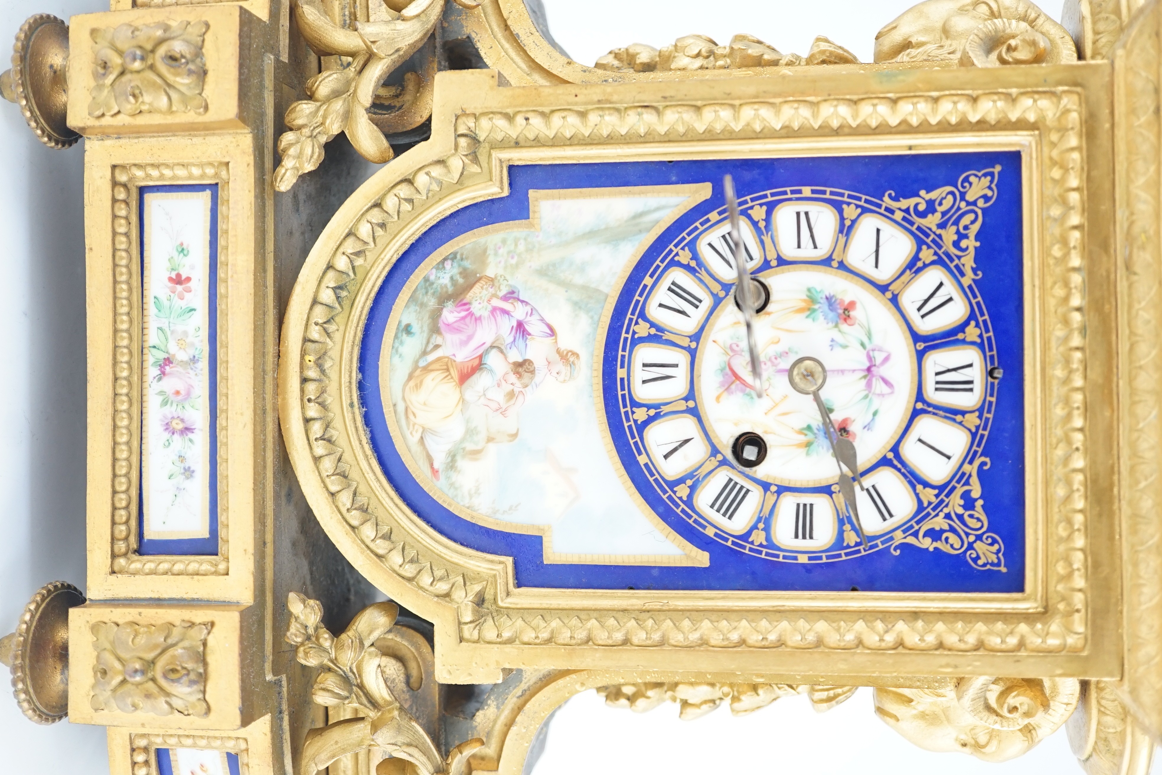 A 19th century French ormolu and Sevres style porcelain mantel clock, 29cm wide, 50cm high